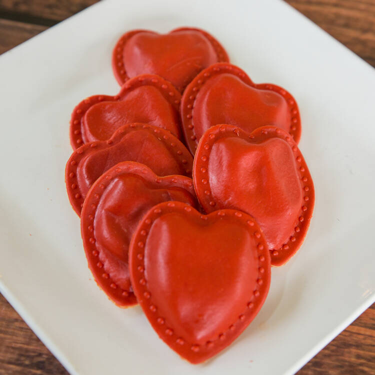 fresh pasta ravioli in a heart shape, Valentine's Day Special 